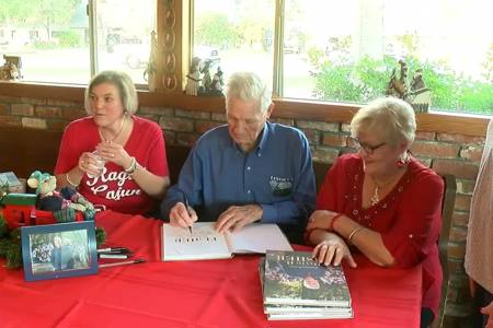 Local WWII vet celebrates 94th birthday, holds book signing for autobiography